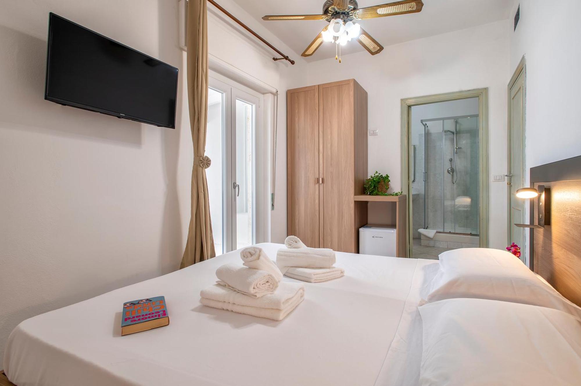 Oasis Guest House Альгеро Экстерьер фото